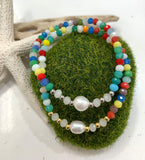 Pulsera una Perla Cristales en Doradas